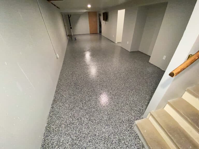 Create a more usable concrete floor with OMG Floor Coatings's 1-day polyurea floor process, as seen in this basement space.